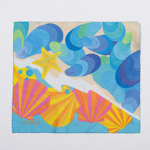 Festive Fish microfiber cloth with shell and fish design, perfect for cleaning or decorative purposes.