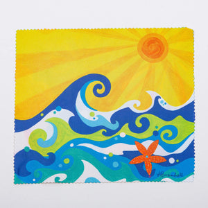 Festive Fish microfiber cloths featuring colorful wave designs, ideal for cleaning or decorative purposes.