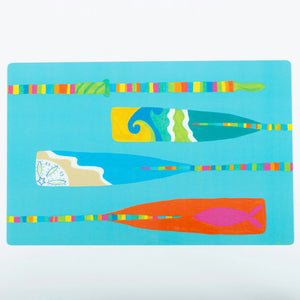 Festive Fish branded placemat featuring colorful oars design, perfect for holiday dining tables.