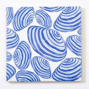 Festive Fish tile coaster featuring colorful clam illustrations on a white background for holiday decor.