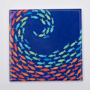 Colorful Festive Fish trivet by Festive Fish featuring a whimsical fish design, perfect for protecting surfaces during holiday meals.
