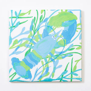 Ice blue lobster-shaped festive trivet by Festive Fish, designed to protect surfaces from hot dishes with vibrant marine style.