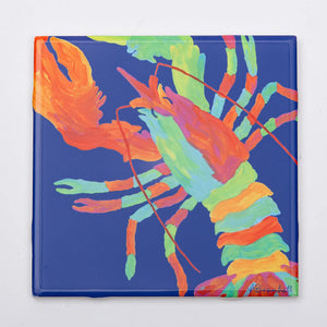 Festive Fish Lefty Lobster trivet featuring a colorful lobster design, ideal for protecting surfaces during festive meals.