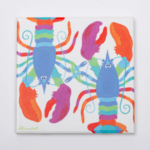 Festive Fish lobster-shaped trivet with colorful, detailed design for protecting surfaces from hot dishes.