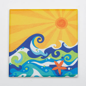 Festive Fish brand decorative trivet with wave pattern, heat-resistant ceramic or metal surface, suitable for holiday or festive table settings.