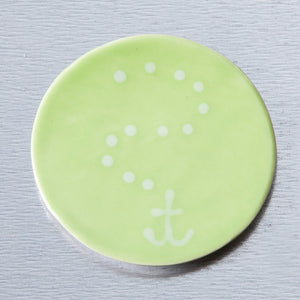 Green ceramic anchor magnet by Lola Arts, featuring a detailed nautical anchor design for decorative or functional use.