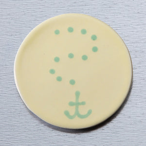 Yellow ceramic anchor magnet by Lola Arts showing a detailed, glossy anchor design perfect for fridge or magnetic decor.