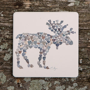 Love Rocks Me moose-shaped coaster featuring engraved love rocks design, made of durable material for protecting surfaces.