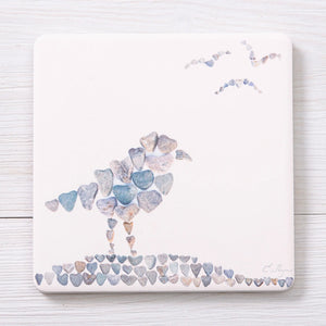 Love Rocks Coasters featuring shore birds design, made by Love Rocks Me, with a natural stone appearance and bird illustrations.