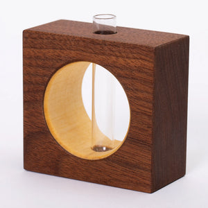 Walnut bud vase by S.E. Hall Furniture featuring a sleek, modern design perfect for small floral arrangements.