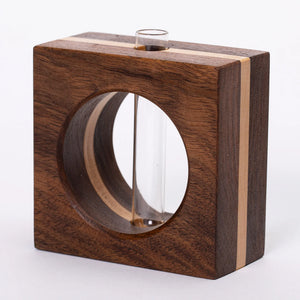 Walnut and maple bud vase by S.E. Hall Furniture with a sleek, modern design and smooth finish.
