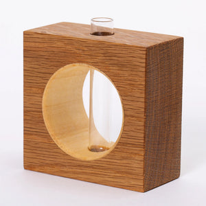 White oak bud vase by S.E. Hall Furniture featuring a sleek, minimalist design for floral display or decorative use.