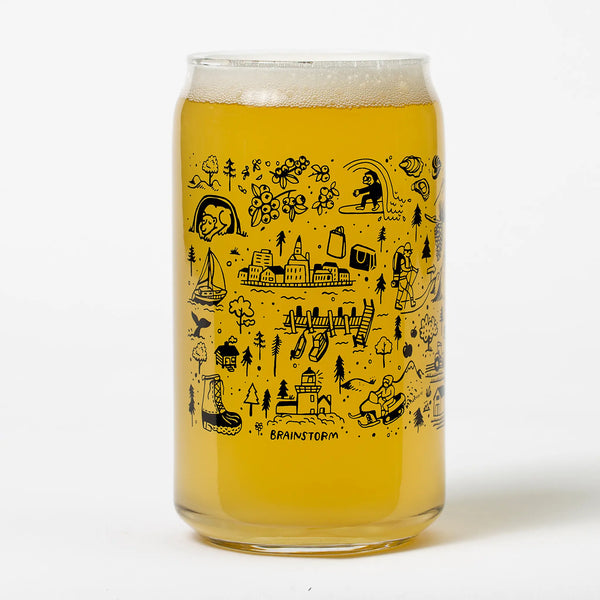 Brainstorm Maine beer can glasses showing the Maine doodles in black and filled with beer