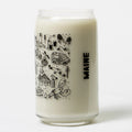 Brainstorm Maine Beer Can Glass with milk inside, clear glass showcasing a fun beer can design, perfect for beer lovers.