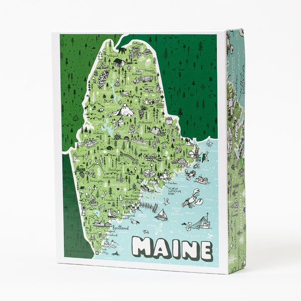Brainstorm boxed Maine puzzle in shades of green and light blue with Maine iconic doodles covering it