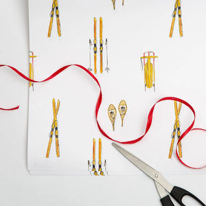 Watercolor gift wraps featuring vintage skis design by Emmy + Olly, perfect for wrapping presents with a whimsical winter theme.