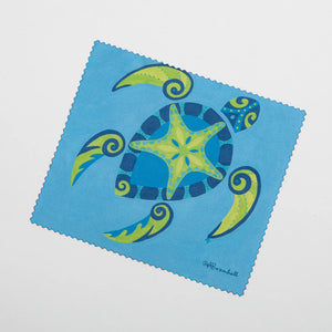Festive Fish microfiber cloth featuring a colorful fish and Maori turtle design, perfect for cleaning and decorative use.