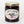 Load image into Gallery viewer, BEAR Jam pepper jelly comes in a clear 9 oz glass jar and is a dark red color with visible raspberry seeds

