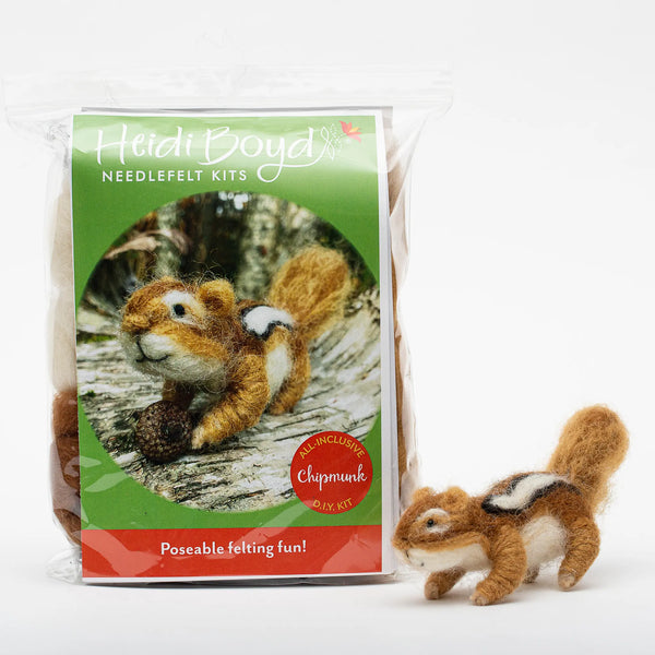 Poseable chipmunk needlefelt kit in clear plastic package next to completed example