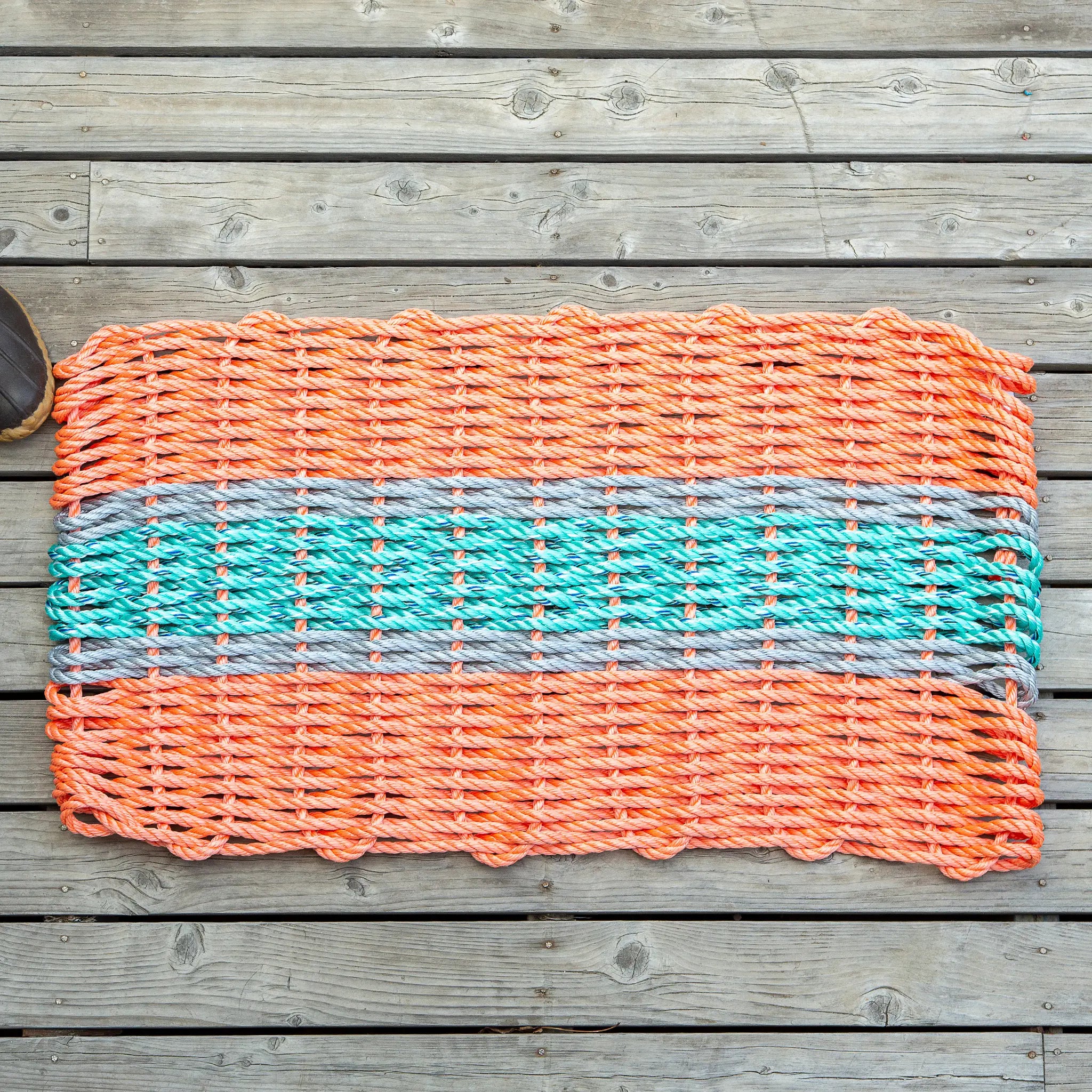 https://shop.downeast.com/cdn/shop/products/little-salty-rope-lobster-rope-mat-31x18-coral-teal-gray.webp?v=1698338555