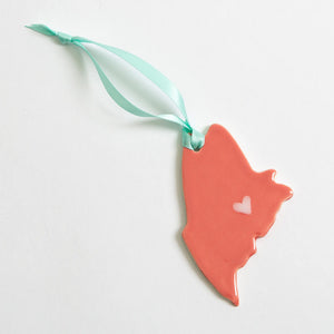 Ceramic Maine ornament by Lola Arts featuring a detailed coral design, perfect for coastal-themed decor or holiday display.